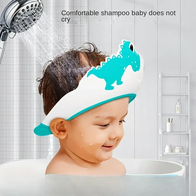 Boné Protetor de Shampoo para Bebê Ajustável em Silicone Macio com Protetores de Ouvido Tema Dinossauro TinySteps — imagem 1
